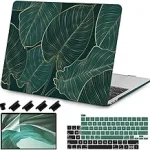 The image shows colorful keyboard skins being applied to a MacBook Pro, highlighting the best options.